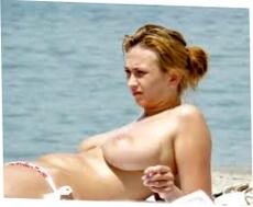 Romanian Female With Big Orbs Sans bra On The Beach Photo 800x642