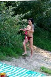 Woman Takes A Much Required Piss Away From Her Neighbors Because They Soiree Plus Eat While At The Beach Nude Beach Fantasies 683x1024